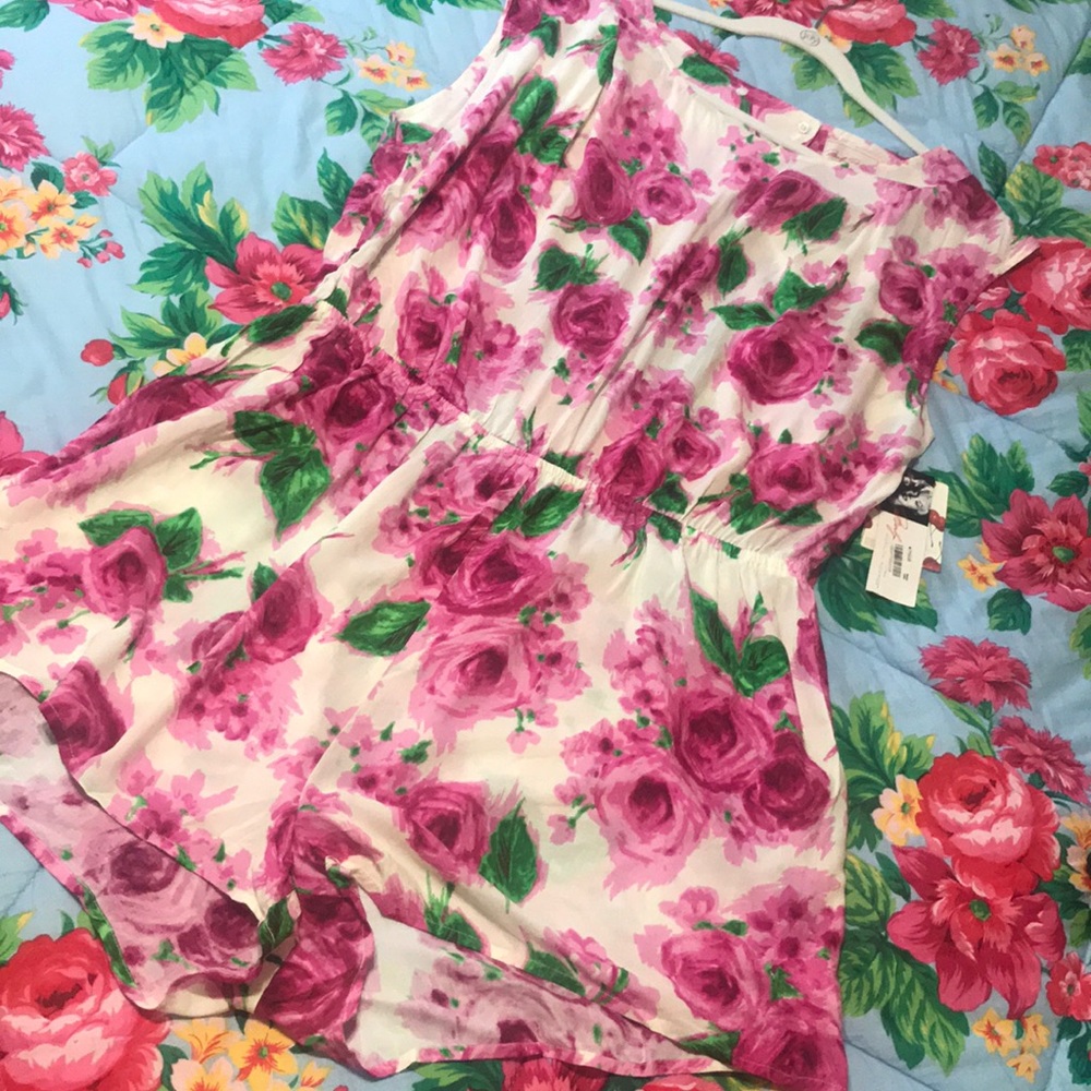 BNWT Marilyn Monroe Floral Romper with open back